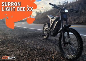 The Surron XX on the side of the road with the title Surron Light Bee XX