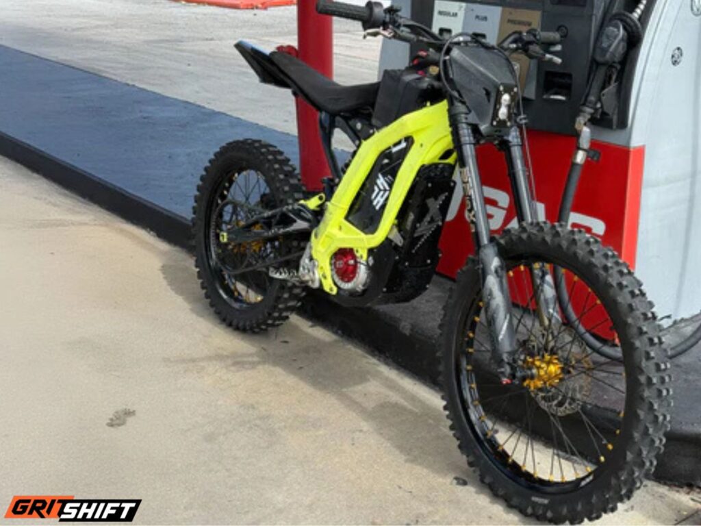 A Surron with the Rift Mask installed