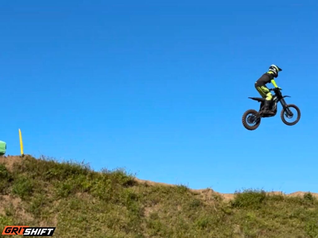 a rider on a big jump on the E Ride Pro SR