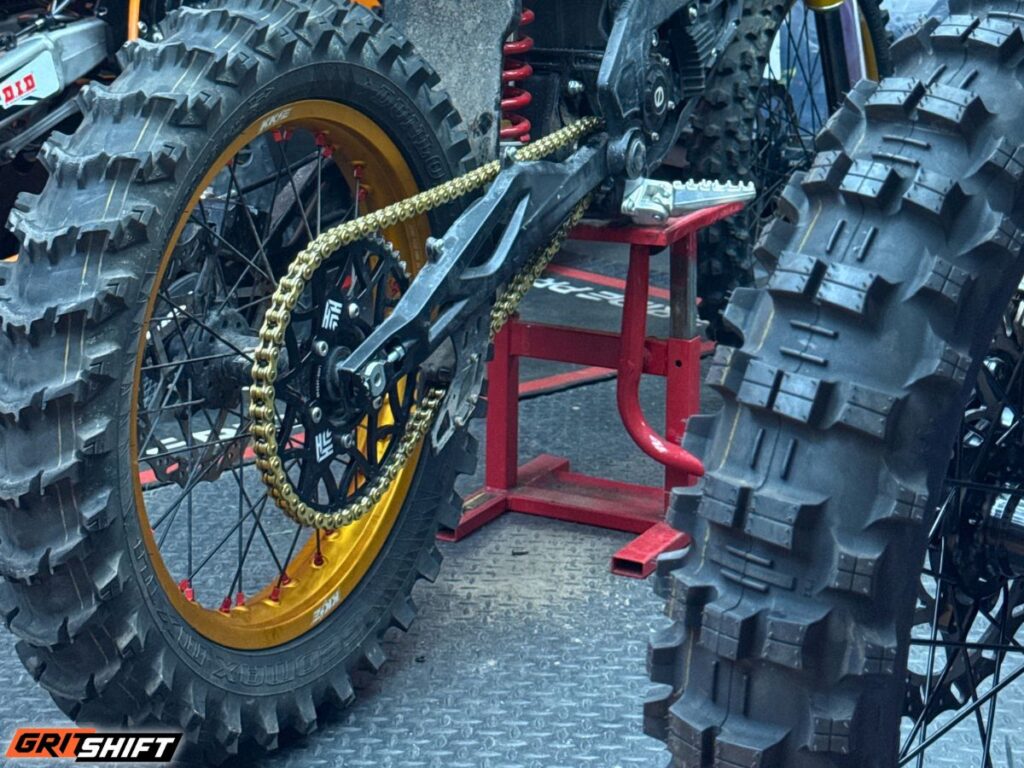 a rear view of an electric dirt bike with the Super Sprocket installed 
